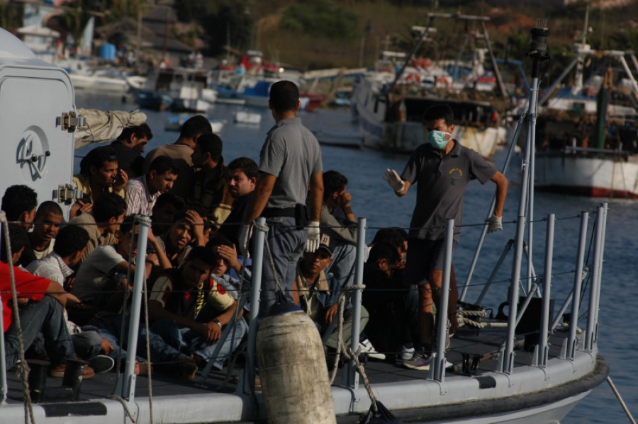 Migranti přijíždějící na ostrov Lampedusa
